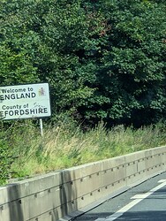 Sign on the side of the A40 (eastbound) towards Ross-on-Wye, it says "Welcome to England; County of Herefordshire"