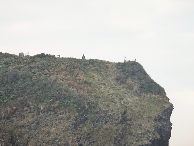 High quality image of people on a cliff