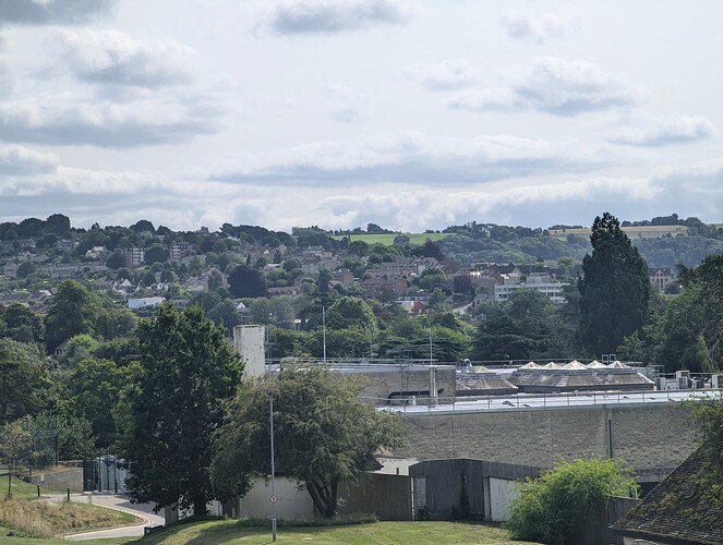 Zoomed in image of various buildings on a hill